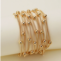 Gold Beads and Coils Bracelet Set